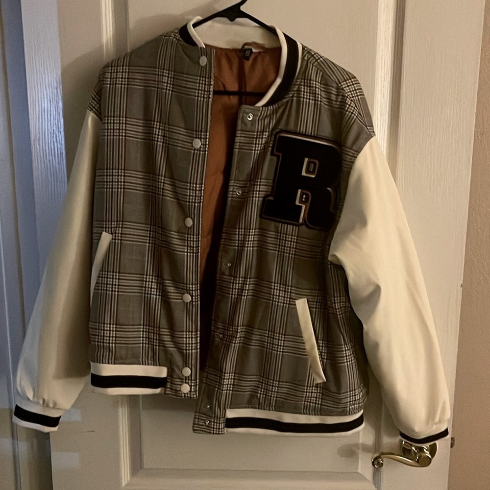 Varsity jacket from H&M.  Never worn.  Great condition.  Size small.